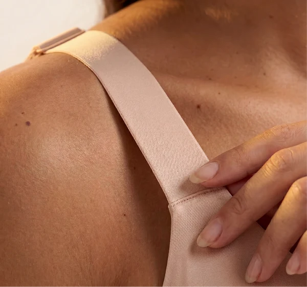 Wide bra strap on the shoulder